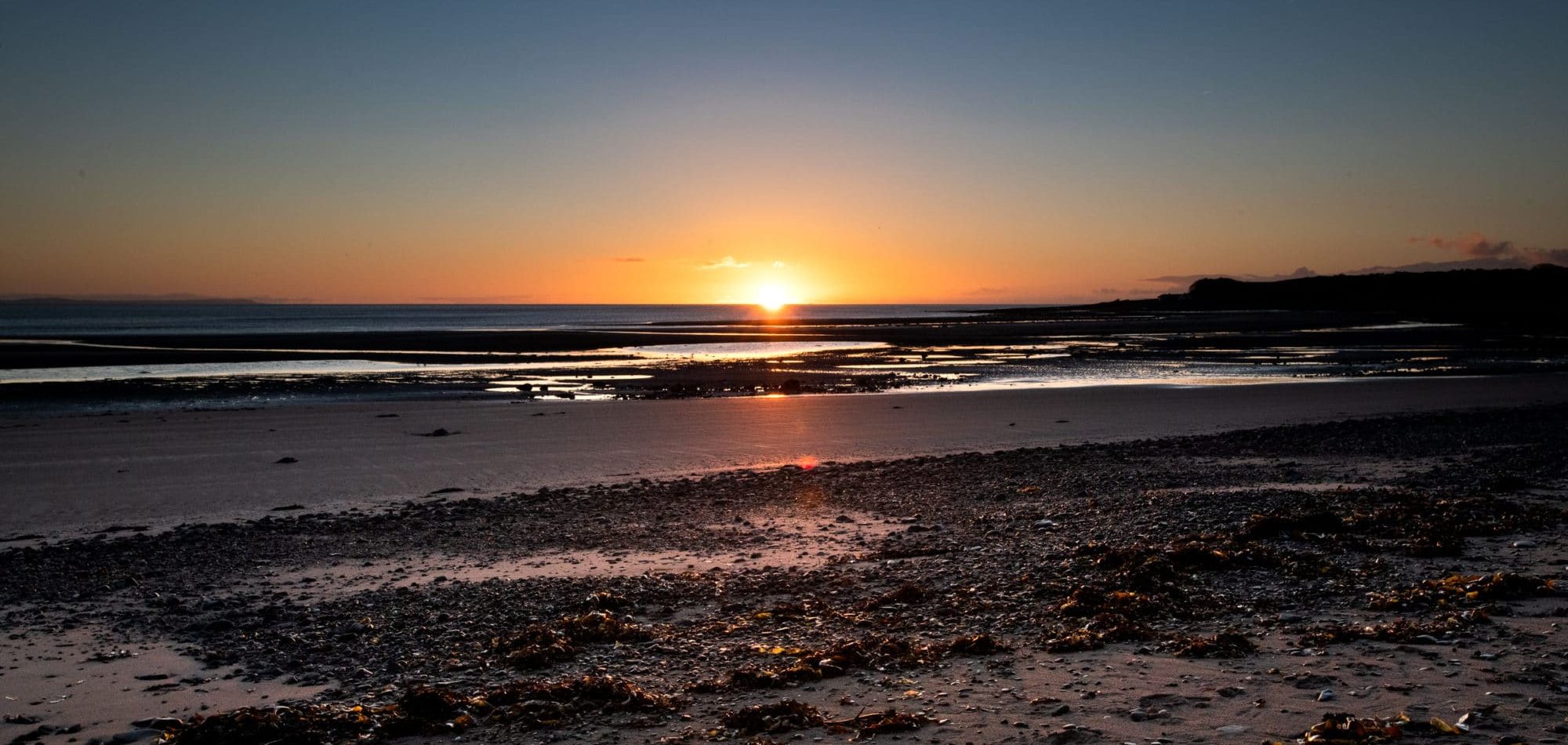 Les levers de soleil de la baie de Sandhead