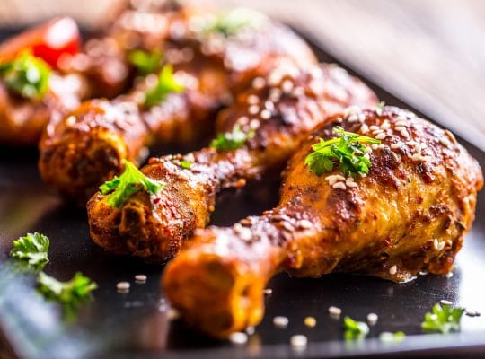 Flambéed chicken legs with whisky